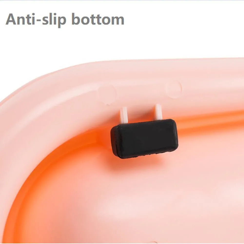 Green leakproof pet bowl with stainless steel interior and non-slip silicone base for dogs and cats.