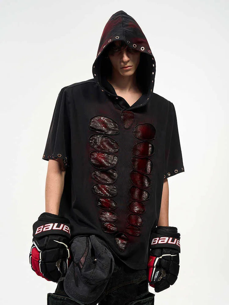 Black men's hooded short-sleeve t-shirt with sequin details, shown in a loose fit.