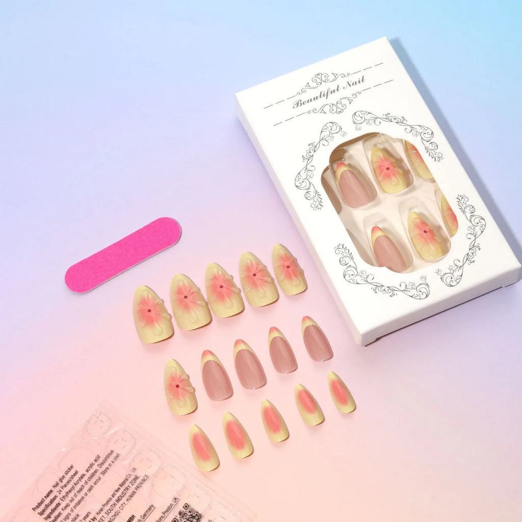 Simple fake nails set with pink and white 3D cartoon flower designs on detachable plastic armour pieces.