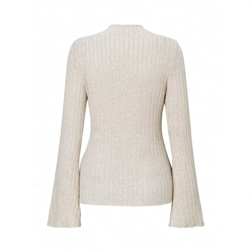 Black slim fit long sleeve polyester top with round neck and lantern sleeves on a hanger