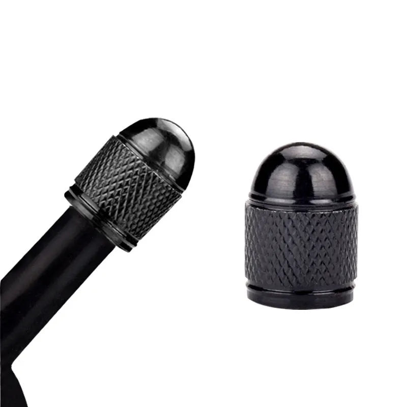 Aluminium mountain bike tyre valve dust cap in assorted colours: black, blue, gold, red, silver.