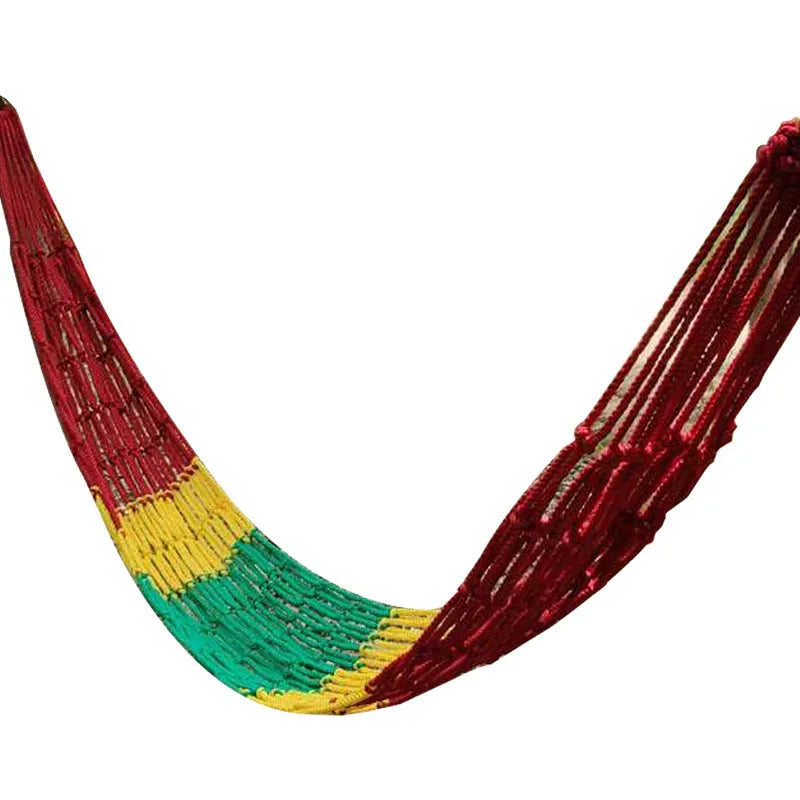 Nylon rope mesh hammock hung outdoors, showing its woven design and included tying ropes.