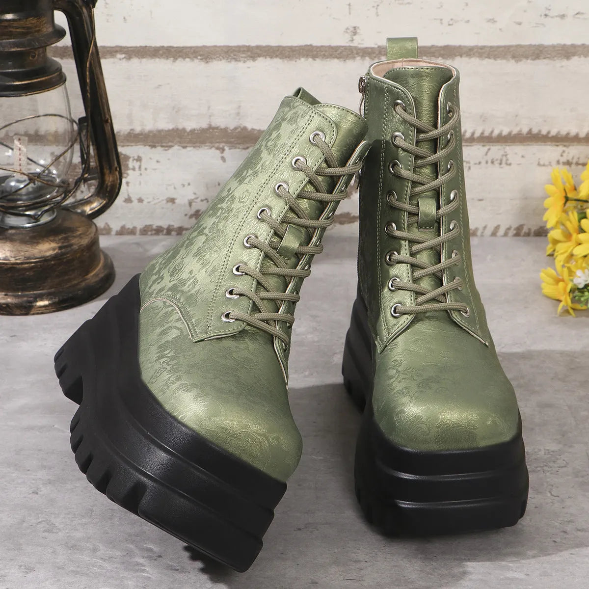 Women's white retro platform Martin boots with patchwork design and side zip.