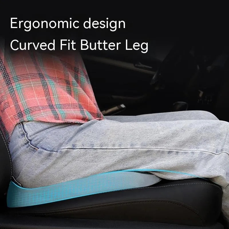 Curved bevel seat cushion for tailbone support in choice of colours on a chair.