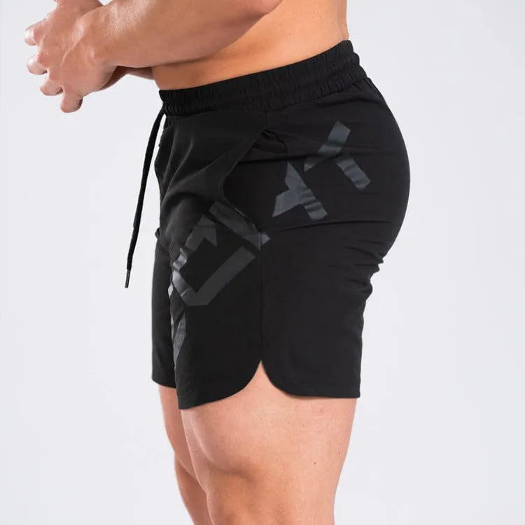 Men's black quick-dry running shorts with elastic waist and knee-length design for summer sports