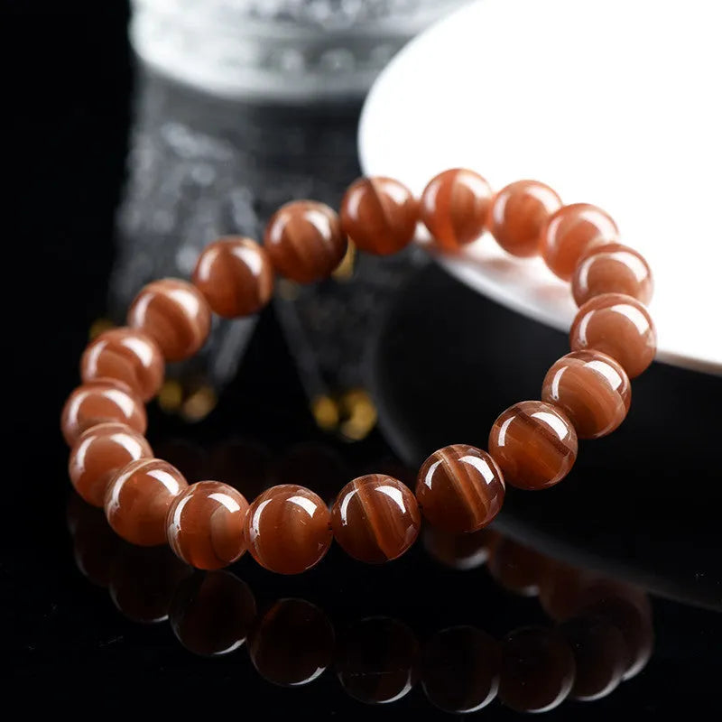 Natural old mine rhodochrosite round beads bracelet from Peru with geometric shape and Ruyi design elements