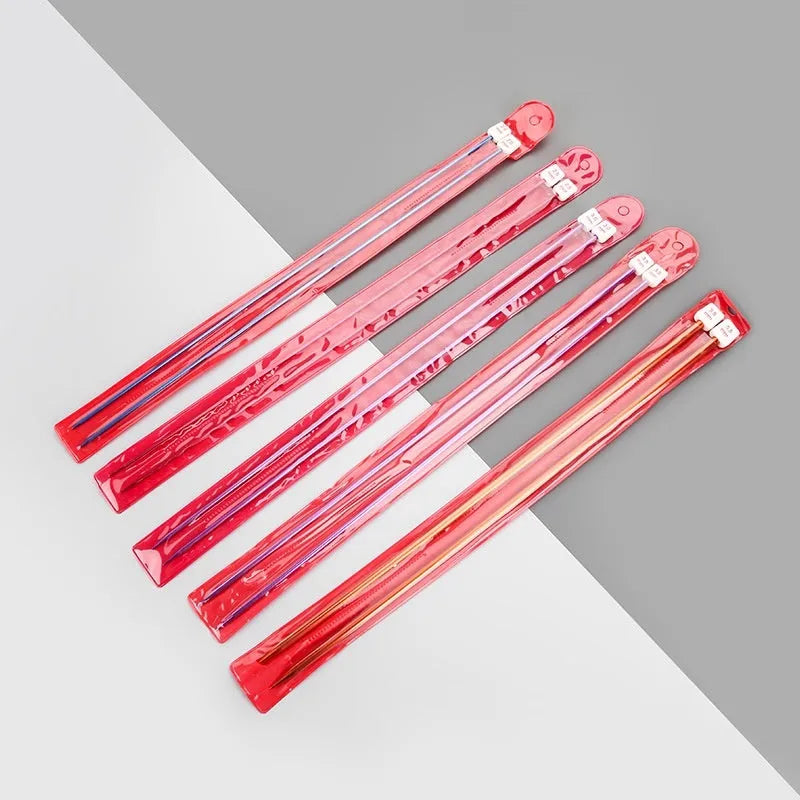 Lengthened crochet hook set showing multiple sizes with protective caps on ergonomic handles