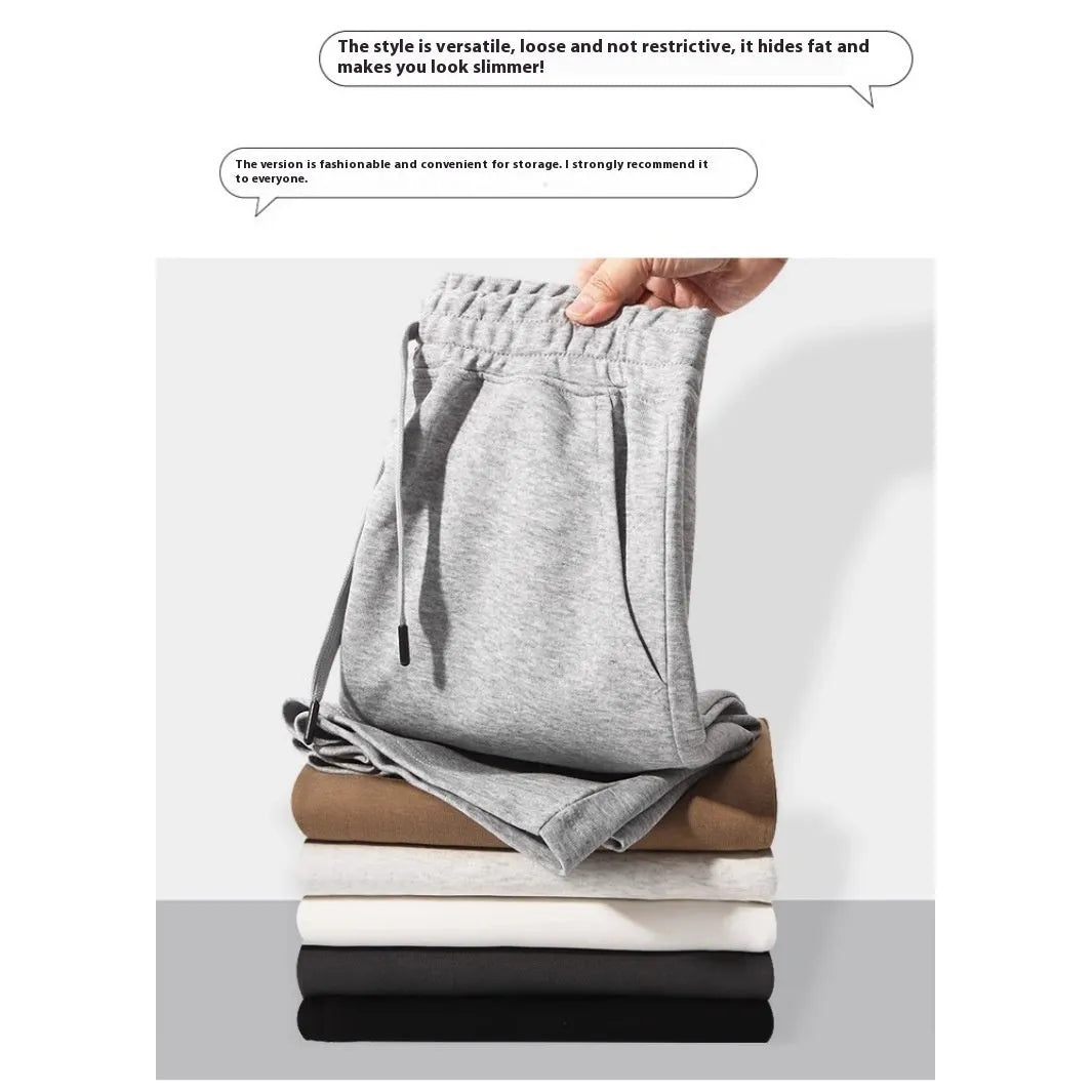 Men's straight leg cotton sports shorts in a light grey colour, showing a relaxed fit suitable for summer.