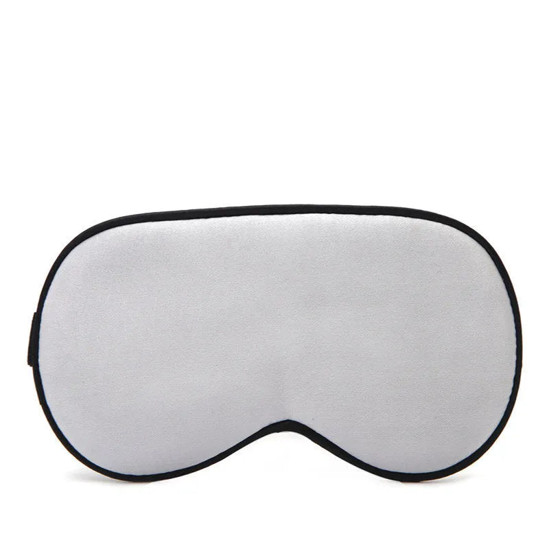 Double-sided mulberry silk sleep eye mask with embroidered printed pattern in various colours.