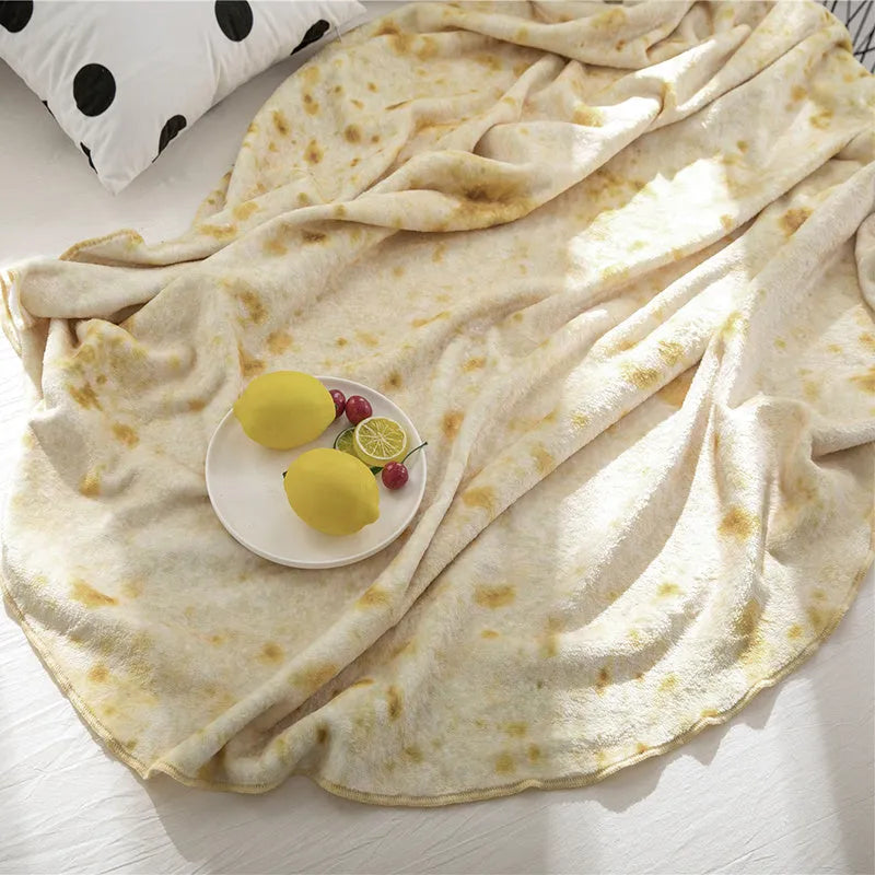 Round burrito blanket with coral fleece texture and food-themed print