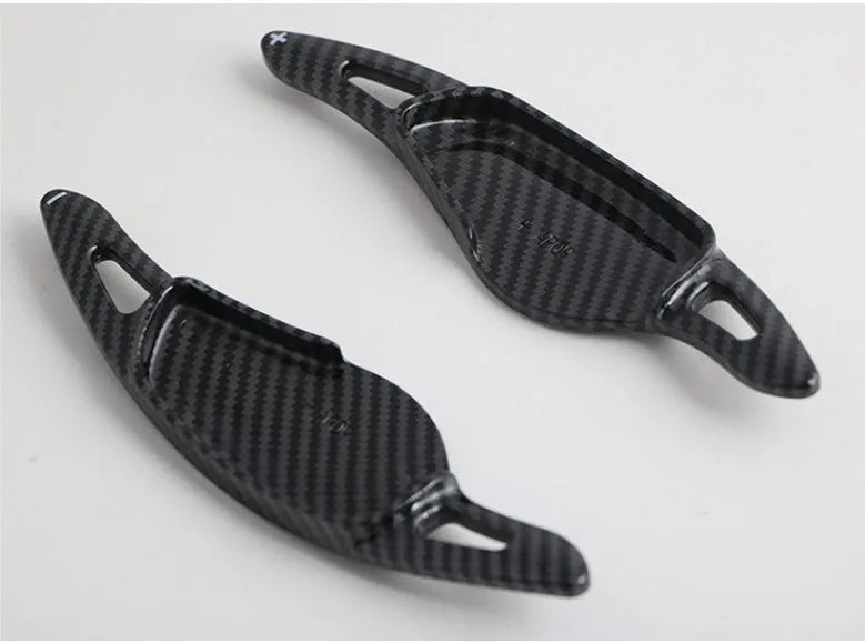 Carbon fibre look steering wheel paddle shift replacements for car interior modification
