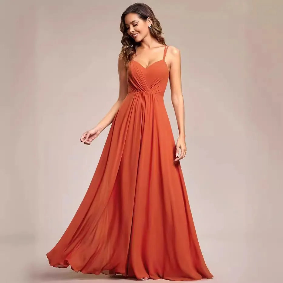 Women's long sleeveless A-line dress with pleated skirt and sling neckline in light green colour