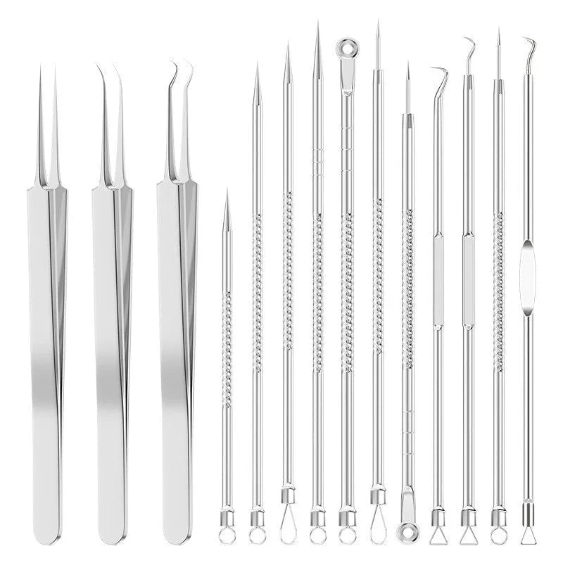 Four silver metal acne needles and a handling clip laid out on a clean surface.