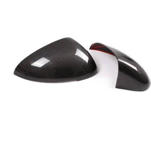 Black carbon fibre rearview mirror covers for Porsche Macan with woven texture detail