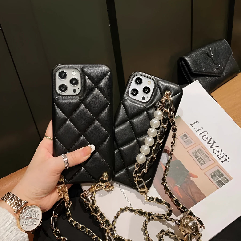 Xiaoxiangfeng imitation leather iPhone case with adjustable cross-body strap and small golden ball detail.