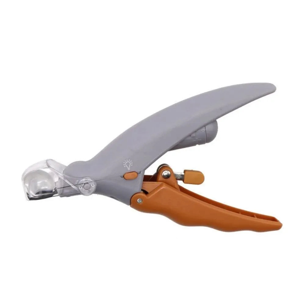 Yellow pet nail clipper with LED light and magnifying lens for trimming dog and cat nails
