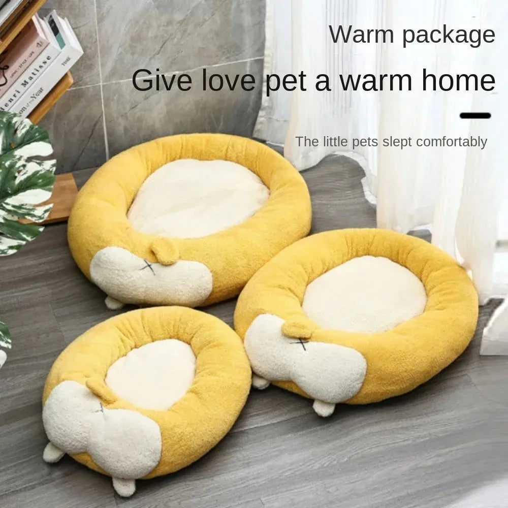 Brown and white corgi-shaped plush dog bed on a wooden floor.