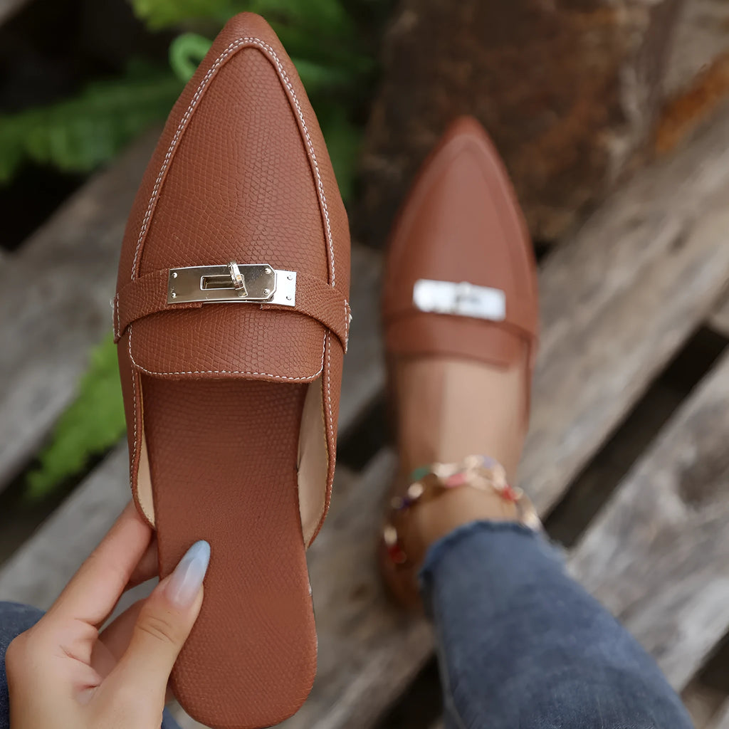 Light brown women's pointed toe low heel semi-slippers with a PU upper and rubber sole.
