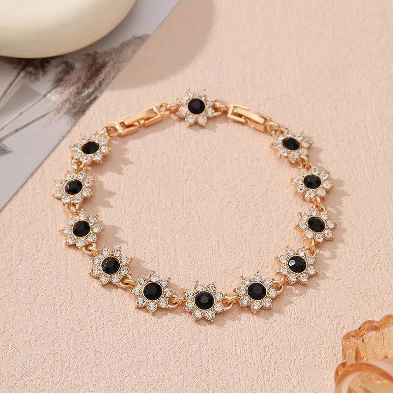 Flower charm bracelet in zinc alloy with electroplated finish and colourful crystal accents