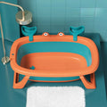Foldable blue portable plastic pet tub for washing a small dog or cat
