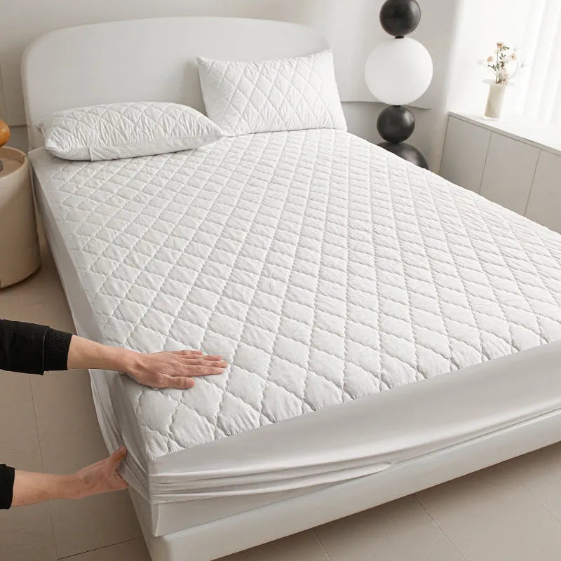 Diamond lattice quilted waterproof mattress protector in bamboo fibre, shown in a solid colour.