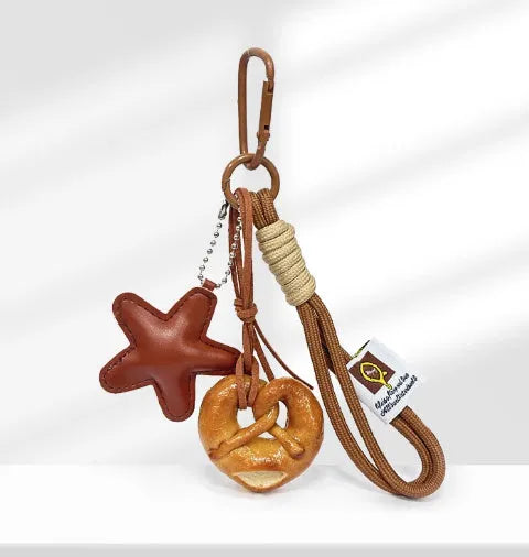 Brown five-pointed star handmade soda bread style handbag pendant with carrying strap