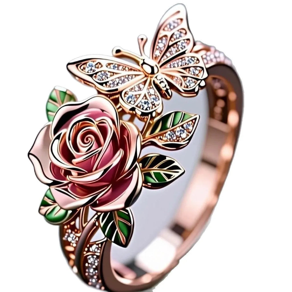 Colourful oil treatment fairy style ring with adjustable alloy construction showing flower, insect and leaf modelling