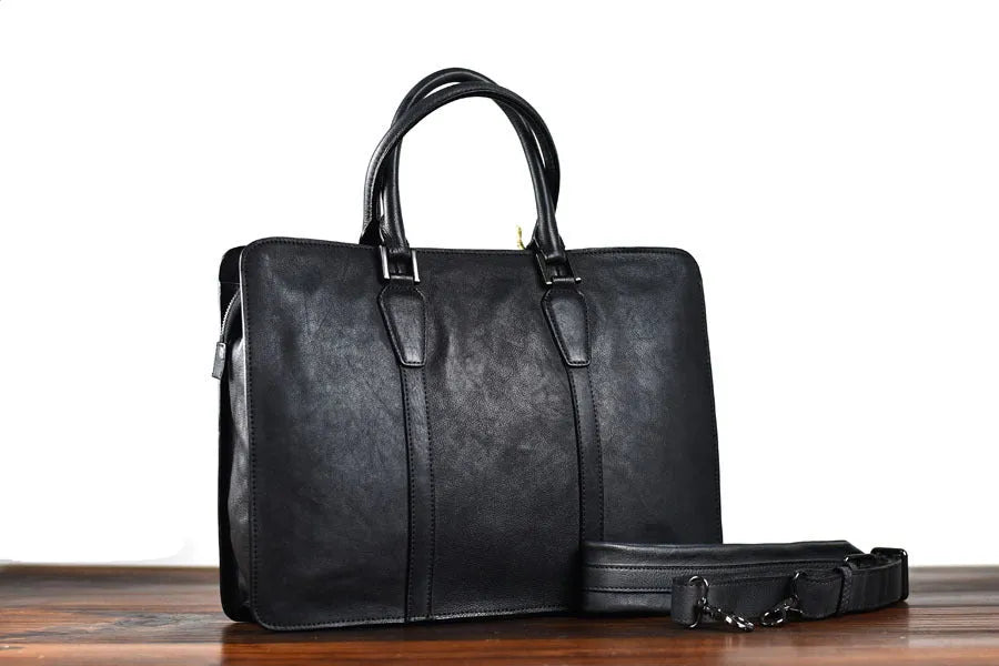 Men's horizontal leather handbag in black or khaki with zipper closure and 14 inch width