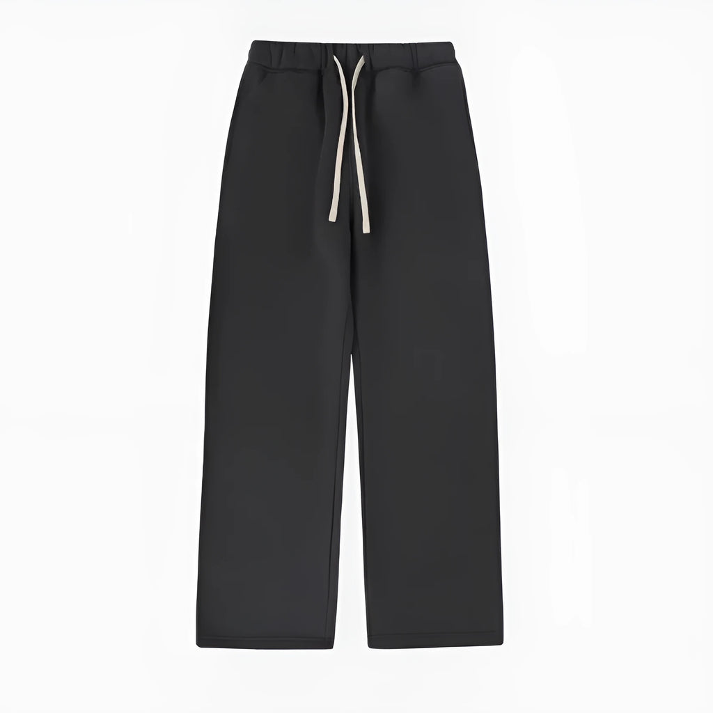 Men's black fleece-lined sweatpants with elastic drawstring waist in loose fit trousers style