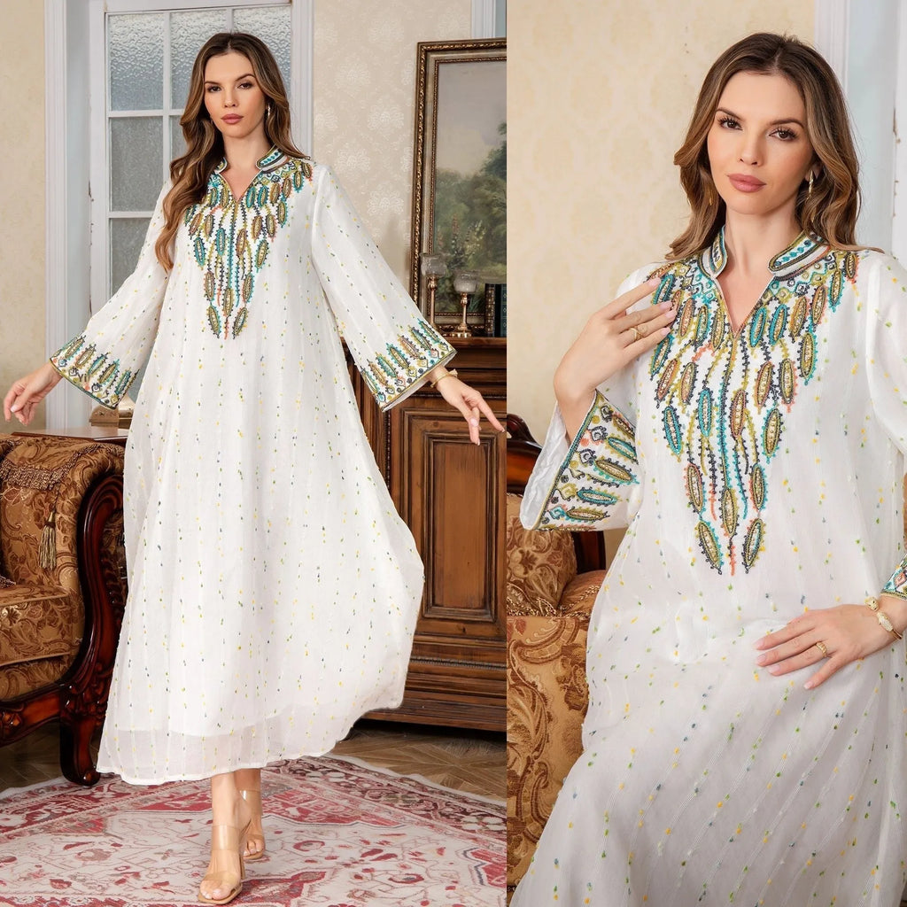 White full-length Arabic robe for women with long sleeves, made from polyester fabric.