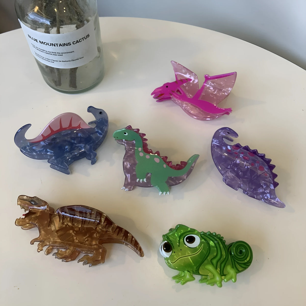 Dinosaur-themed acrylic jaw hair clip with grip barrette clasp in six colour options