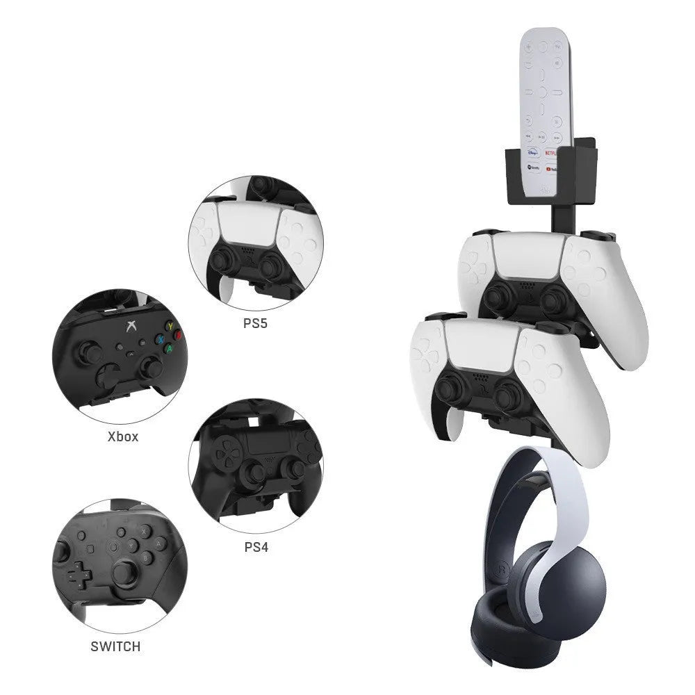 White wall-mounted hook holding a game controller with black console compatibility labels