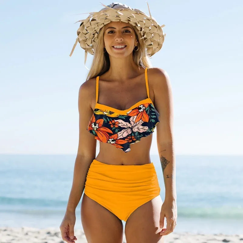 Women's blue floral high-waisted split bikini swimsuit set with pleated pants