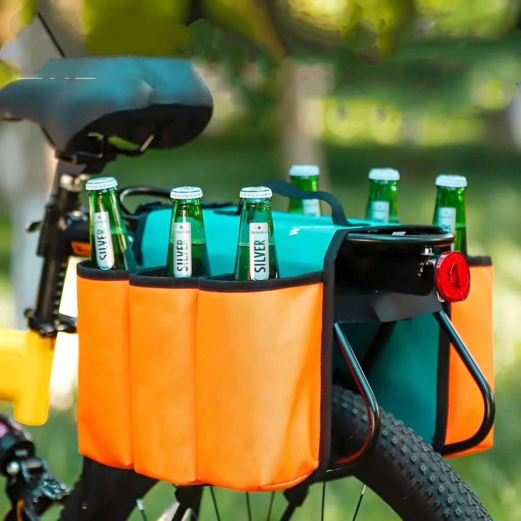 Black and orange double-sided bicycle drink bag made from 600D PVC mounted on handlebars.