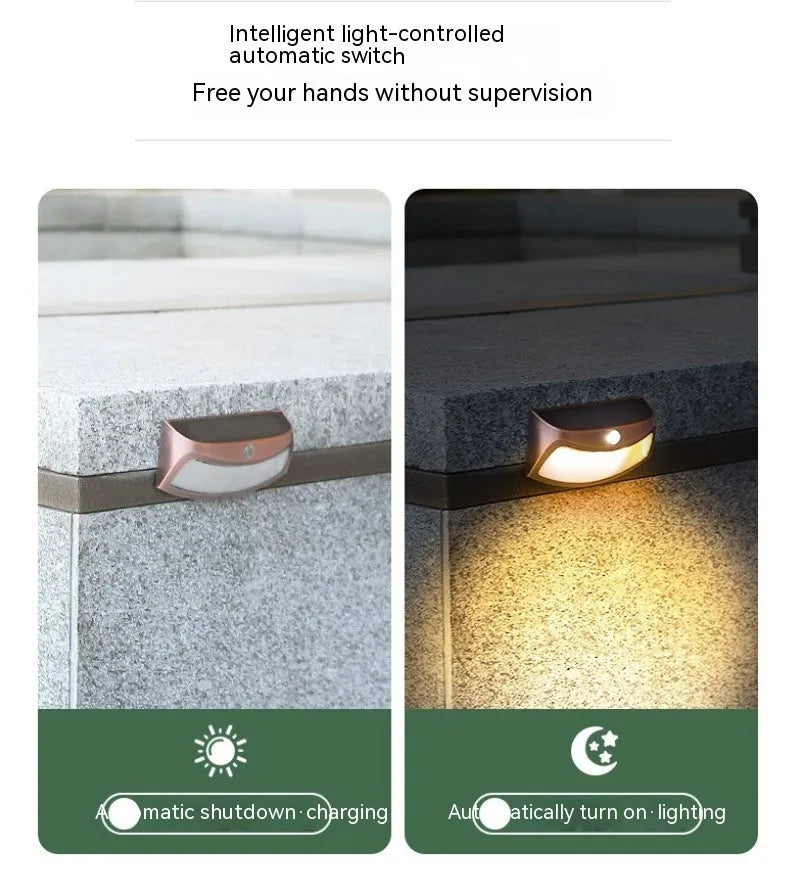 Solar outdoor wall lamp with smiling face design for garden courtyard lighting