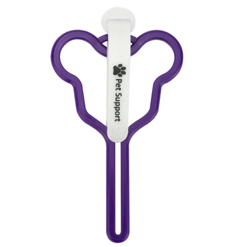 A hands-free dog poo bag holder with a fixed clip and adjustable Velcro strap attached to a dog lead.