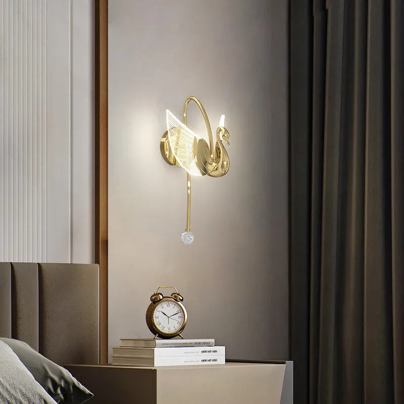 Modern gold swan-shaped wall lamp with acrylic shade and dimmable multi-colour LED lighting