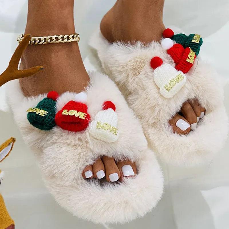 Women's Christmas hat decoration slippers in faux plush with rubber sole.