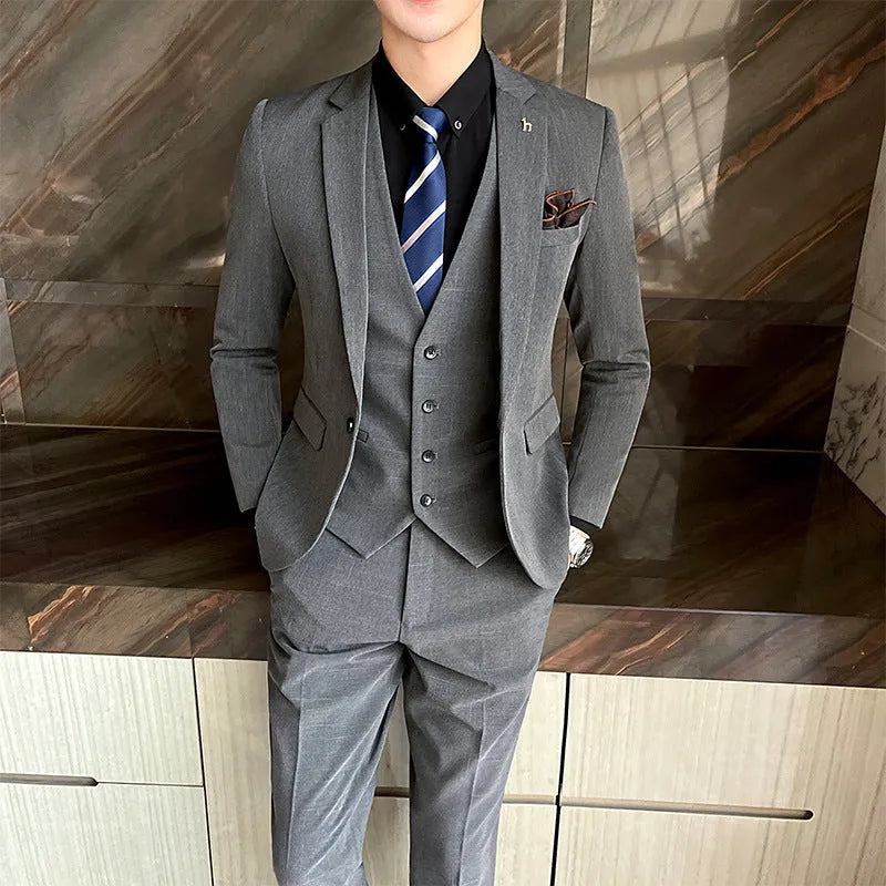 Slim fit British style men's business suit in black or dark grey cotton blend fabric