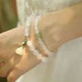 S925 silver bracelet with white agate and Hetian jade stones in geometric lotus design