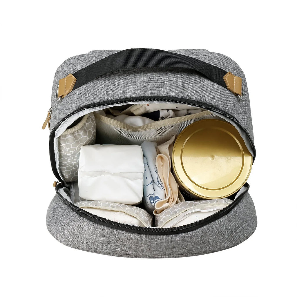 Grey insulated Oxford cloth mother and child travel backpack with curved shoulder straps