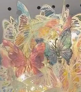 Butterfly night lamp with glass shade on raw wood base, showing 12x15cm size.