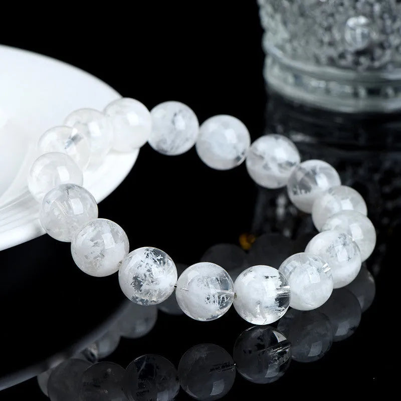 Natural crystal women's bracelet with blizzard snowflake round beads featuring Ruyi and Xiangyun design elements