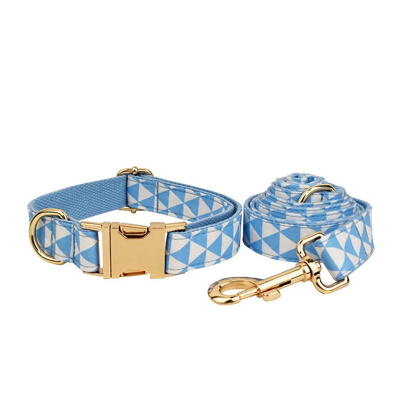 Blue triangular ring rope dog vest, collar, leash, and bow four-piece set laid out flat.