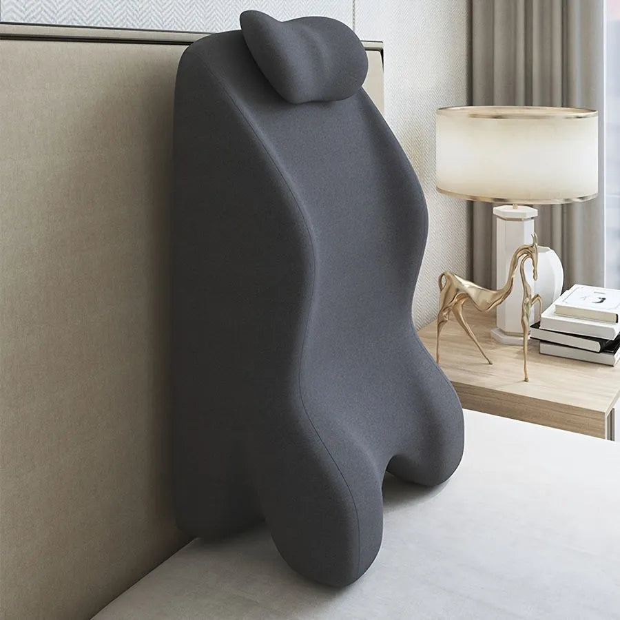 Wedge-shaped stomach sleeper pillow with arm slots shown in light grey colour