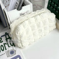 Fashion personality cream puff style polyester pencil case in beige or black colours with zip closure