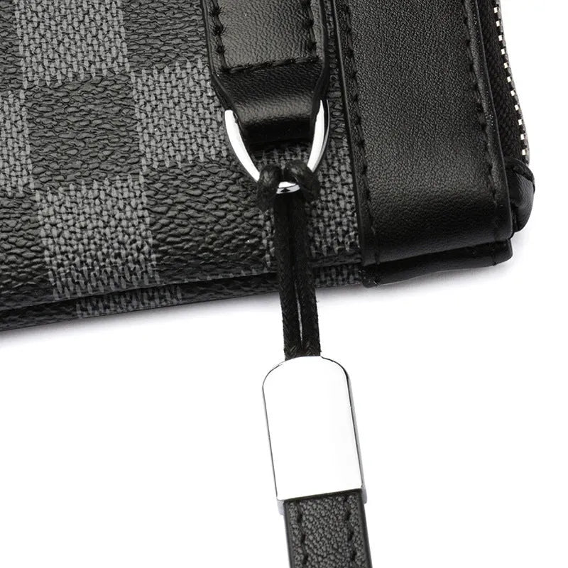 Black men's clutch wallet made from first layer cowhide leather, showing front view.