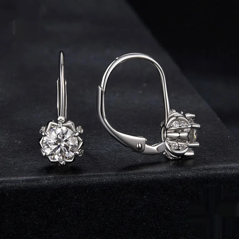 Sterling silver flower bud clip-on earrings with 0.5 carat moissanite centrepiece and white gold plating