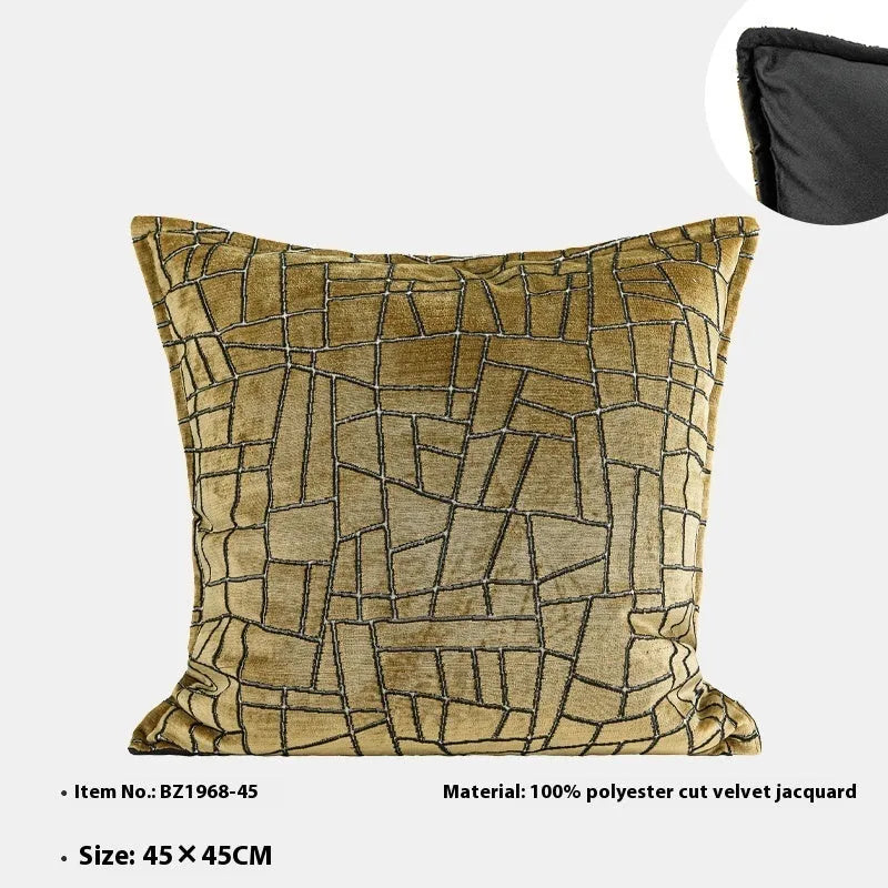 Tuhao gold geometric abstract pattern on a velvet square cushion cover and lumbar pillow.