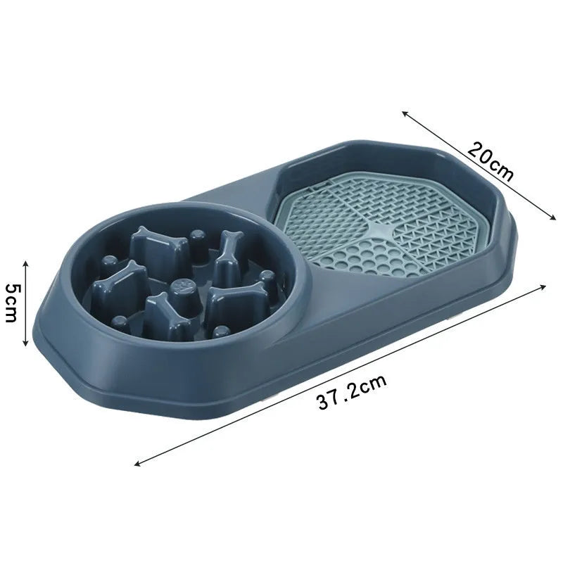 Blue slow feeder dog bowl with puzzle ridges and non-slip base, shown with dog kibble.